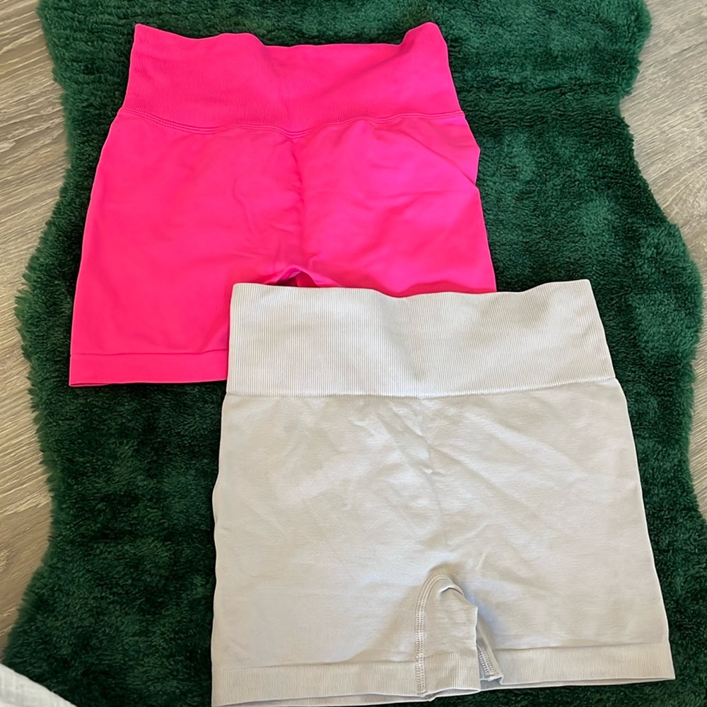 Two biker/gym shorts from Shein. Great quality! Pink and grey